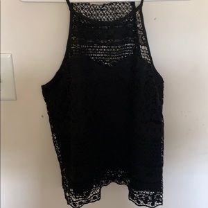 A black tank top or a crop top